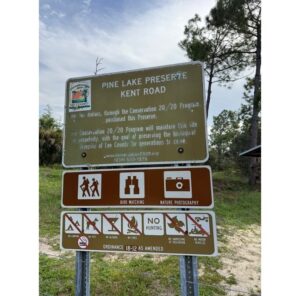 Pine Lake Preserve entrance sign on Kent Road listing permitted activities