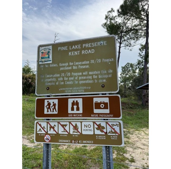 Pine Lake Preserve entrance sign on Kent Road listing permitted activities